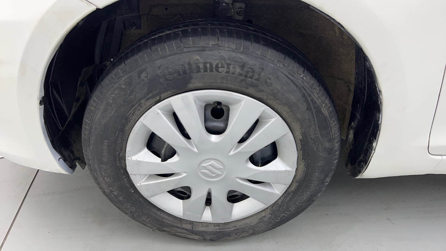 Used 2013 Maruti Suzuki Swift Dzire VXI Petrol Manual tyres LEFT FRONT TYRE RIM VIEW