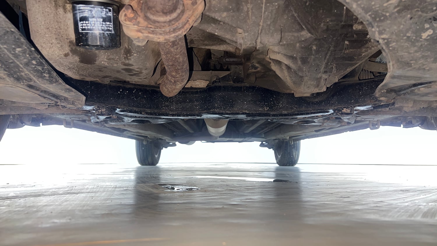 Used 2018 Maruti Suzuki Ertiga ZXI+ Petrol Manual extra FRONT LEFT UNDERBODY VIEW