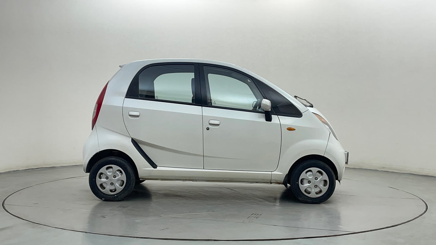 Used 2012 Tata Nano LX Petrol Manual exterior RIGHT SIDE VIEW