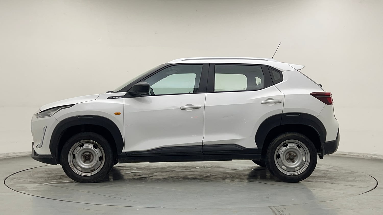 Used 2021 Nissan Magnite XE Petrol Manual exterior LEFT SIDE VIEW