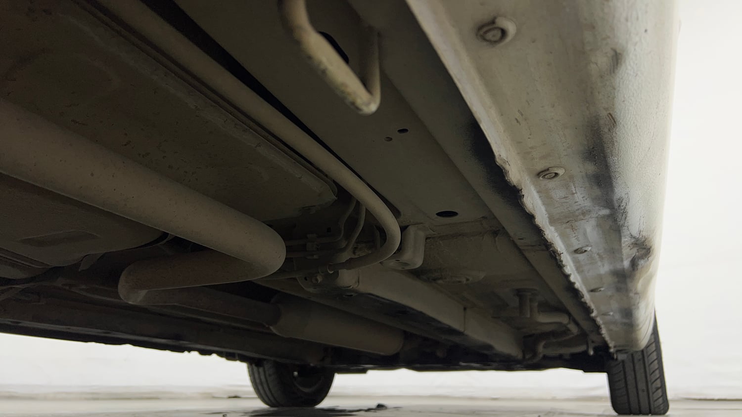 Used 2013 Maruti Suzuki Ertiga Vxi Petrol Manual extra REAR RIGHT UNDERBODY VIEW