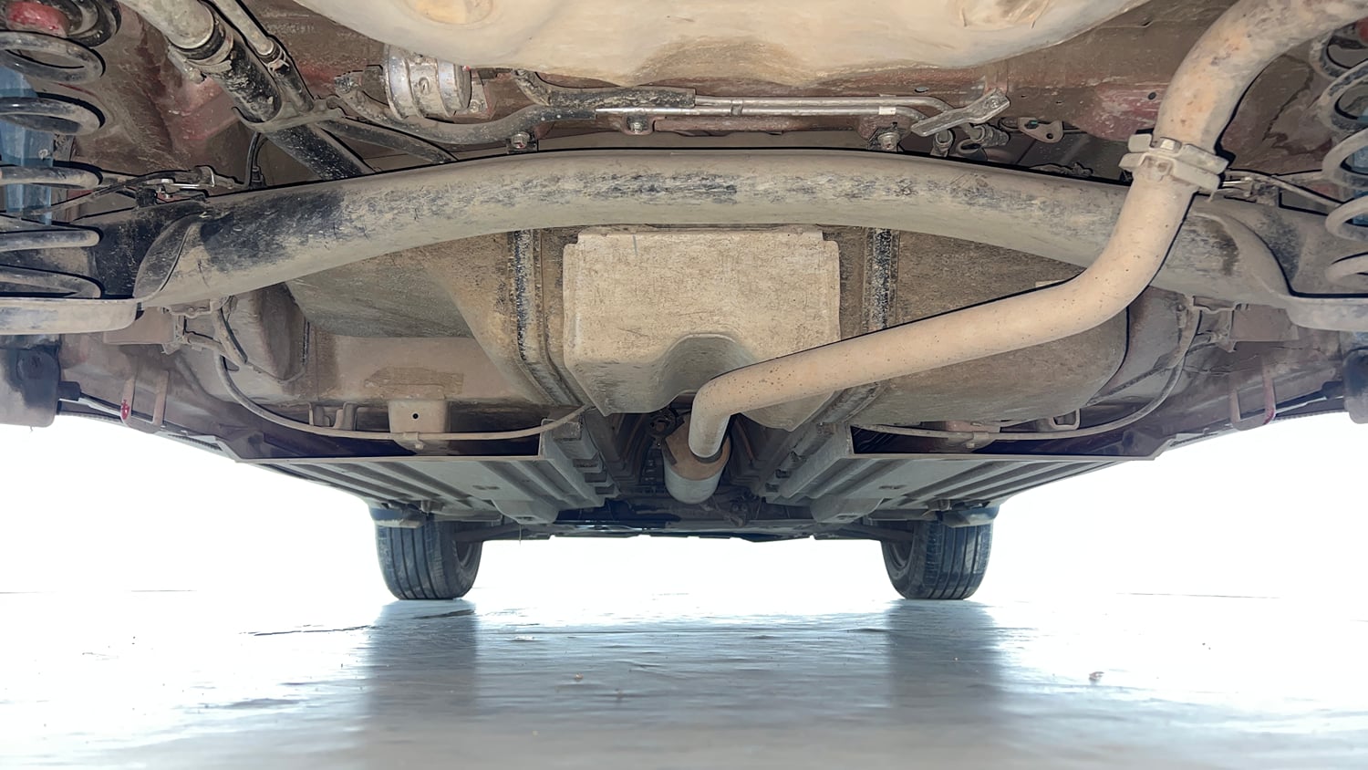 Used 2022 Maruti Suzuki Brezza Vxi AT Petrol Automatic extra REAR UNDERBODY VIEW (TAKEN FROM REAR)