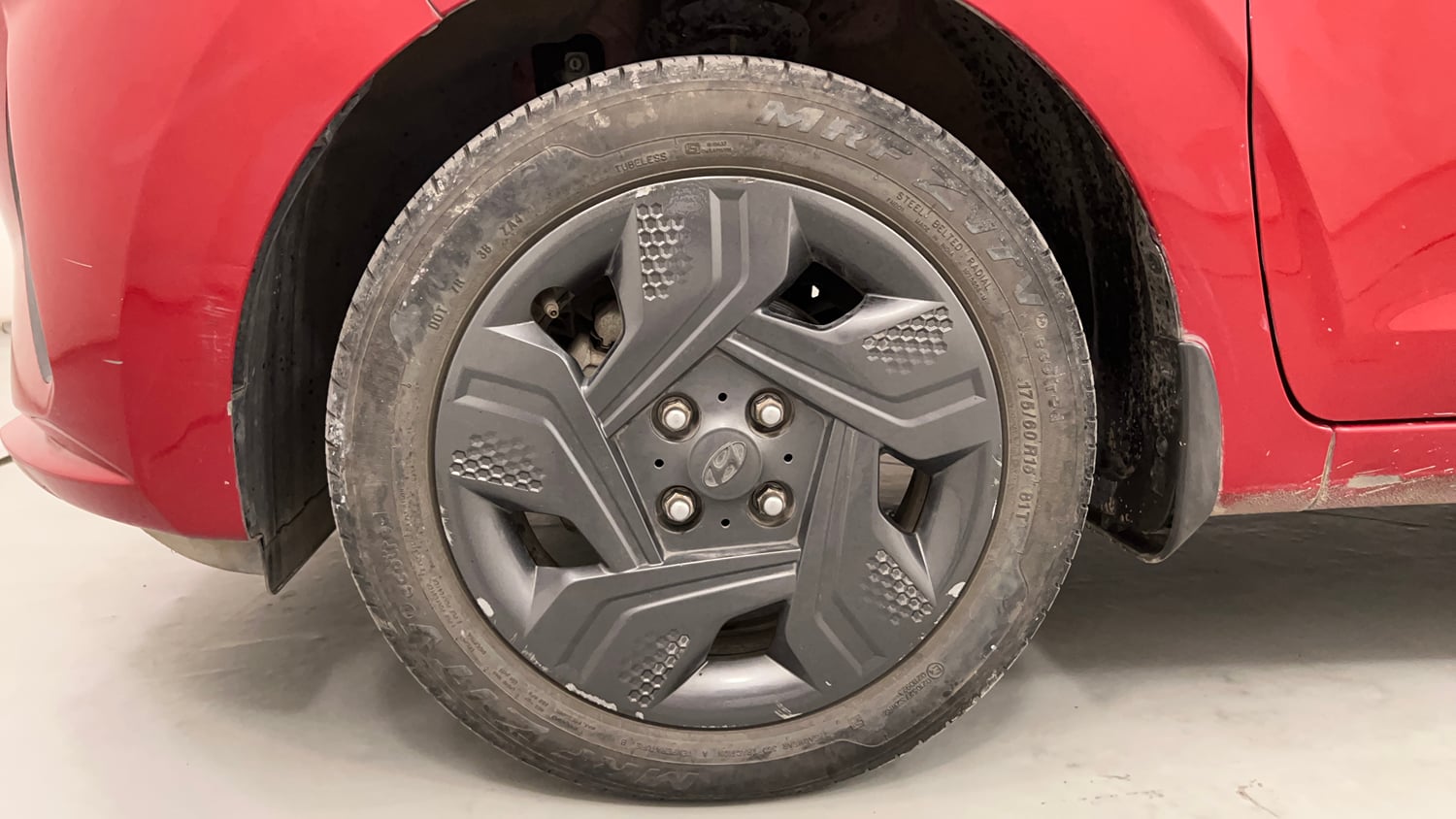 Used 2021 Hyundai Aura S 1.2 AMT Petrol Petrol Automatic tyres LEFT FRONT TYRE RIM VIEW
