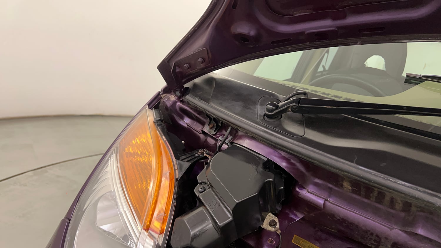 Used 2015 Tata Nano Twist XT Petrol Manual engine ENGINE RIGHT SIDE HINGE & APRON VIEW