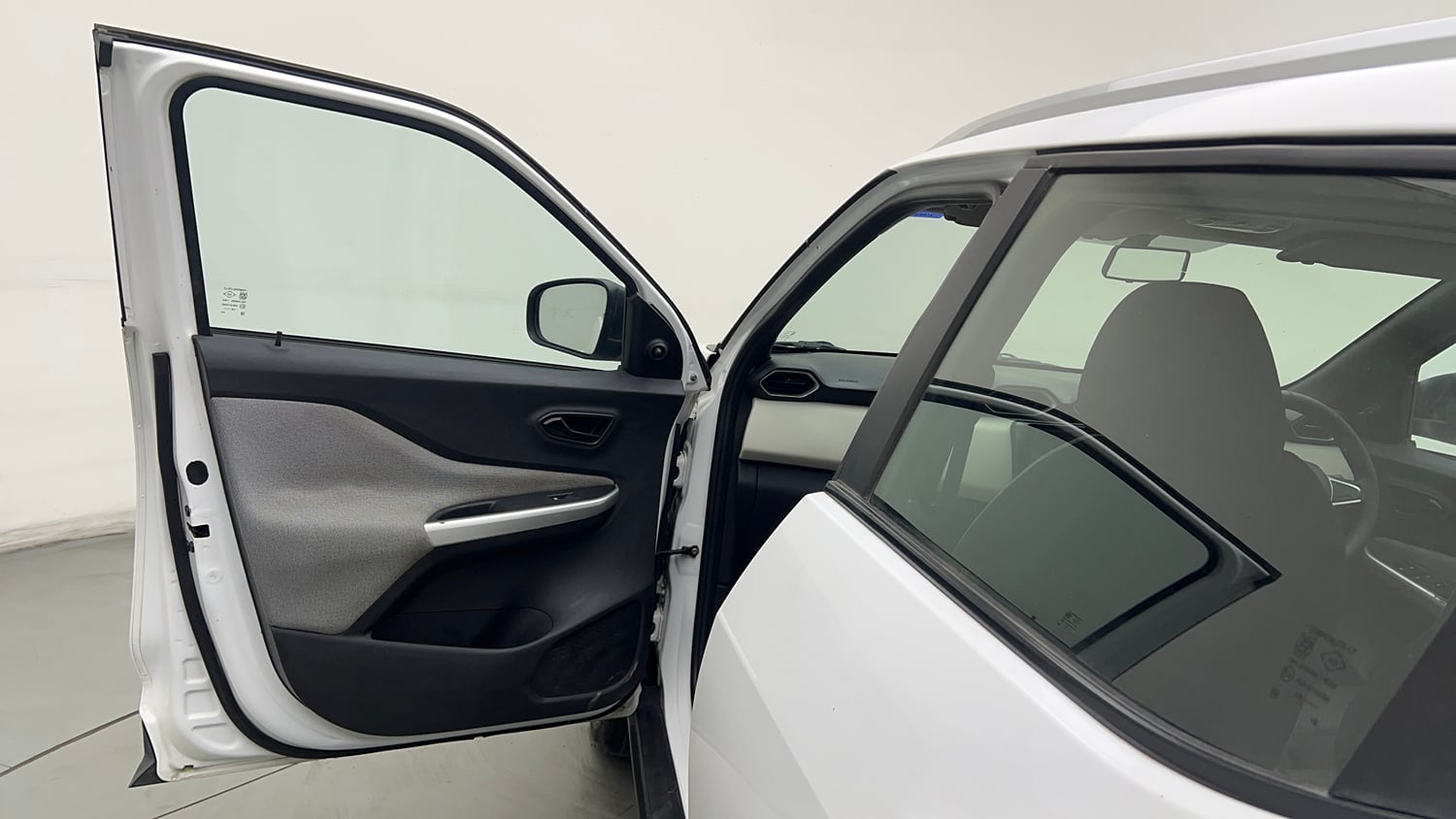 Used 2021 Nissan Magnite XE Petrol Manual interior LEFT FRONT DOOR OPEN VIEW