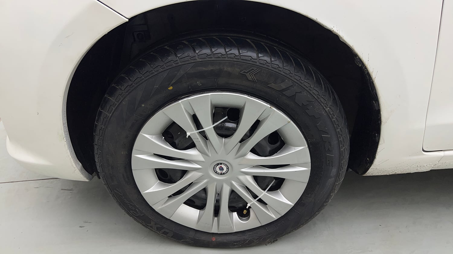 Used 2013 Maruti Suzuki Ertiga Vxi Petrol Manual tyres LEFT FRONT TYRE RIM VIEW