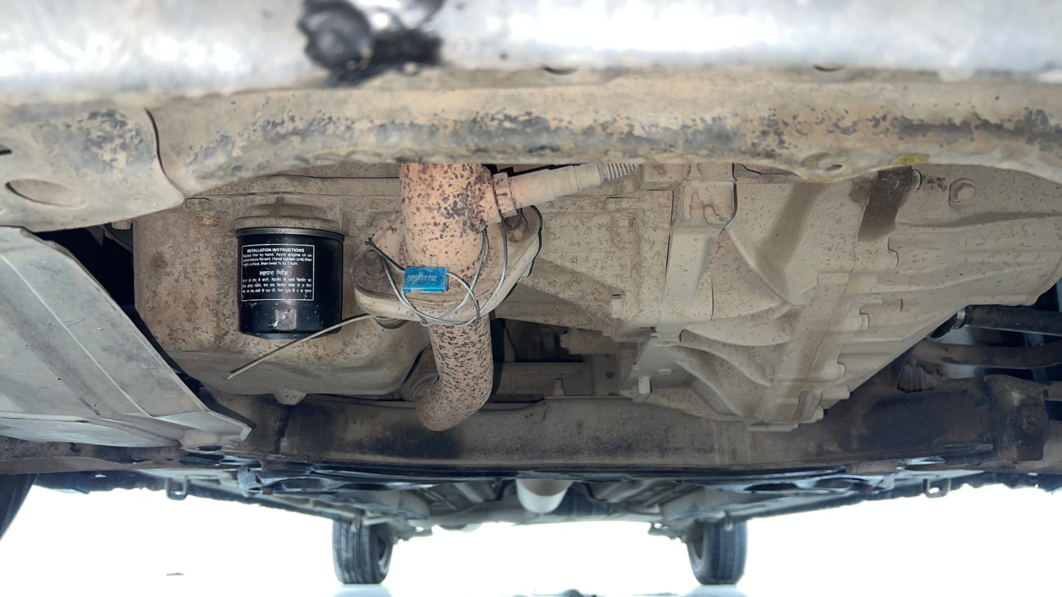 Used 2013 Maruti Suzuki Ertiga Vxi Petrol Manual extra FRONT LEFT UNDERBODY VIEW