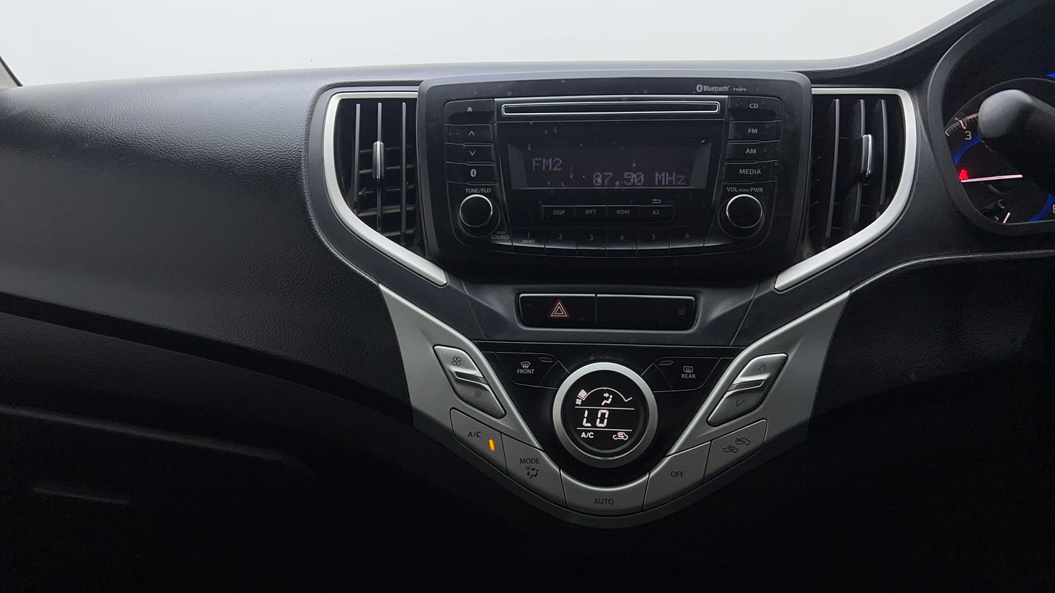 Used 2018 Maruti Suzuki Baleno Delta 1.2 Petrol Manual top_features Integrated (in-dash) music system