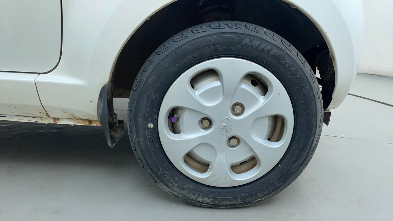 Used 2012 Tata Nano LX Petrol Manual tyres RIGHT FRONT TYRE RIM VIEW