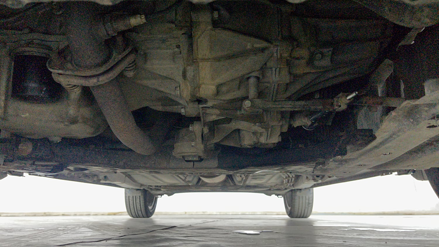 Used 2021 Maruti Suzuki Baleno Zeta Petrol Manual extra FRONT LEFT UNDERBODY VIEW