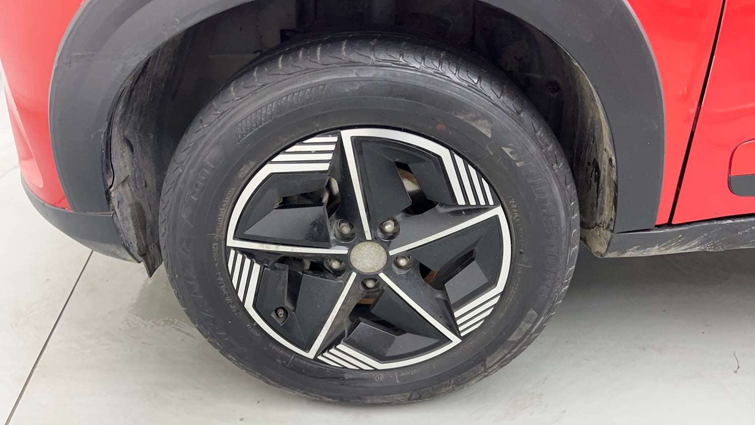 Used 2026 Tata Nexon Fearless Plus S 1.2 Revotron Petrol 7DCA DT Petrol Automatic tyres LEFT FRONT TYRE RIM VIEW