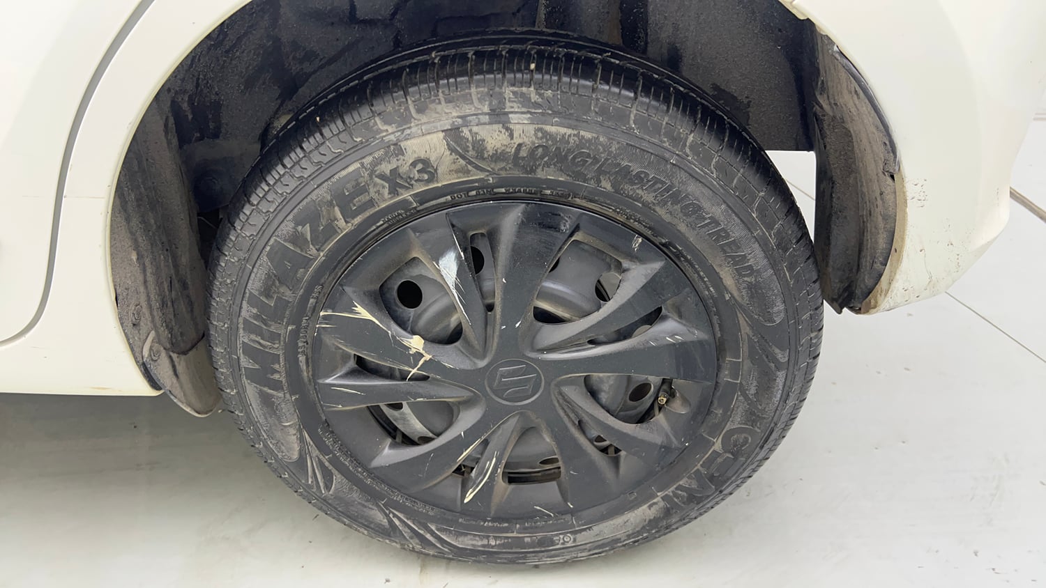 Used 2019 Maruti Suzuki Swift LXi Petrol Manual tyres LEFT REAR TYRE RIM VIEW