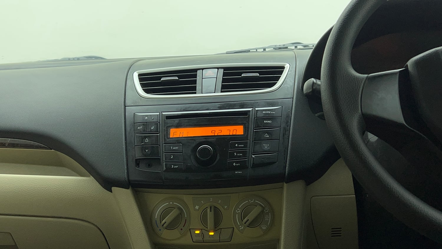 Used 2013 Maruti Suzuki Swift Dzire VXI Petrol Manual top_features Integrated (in-dash) music system