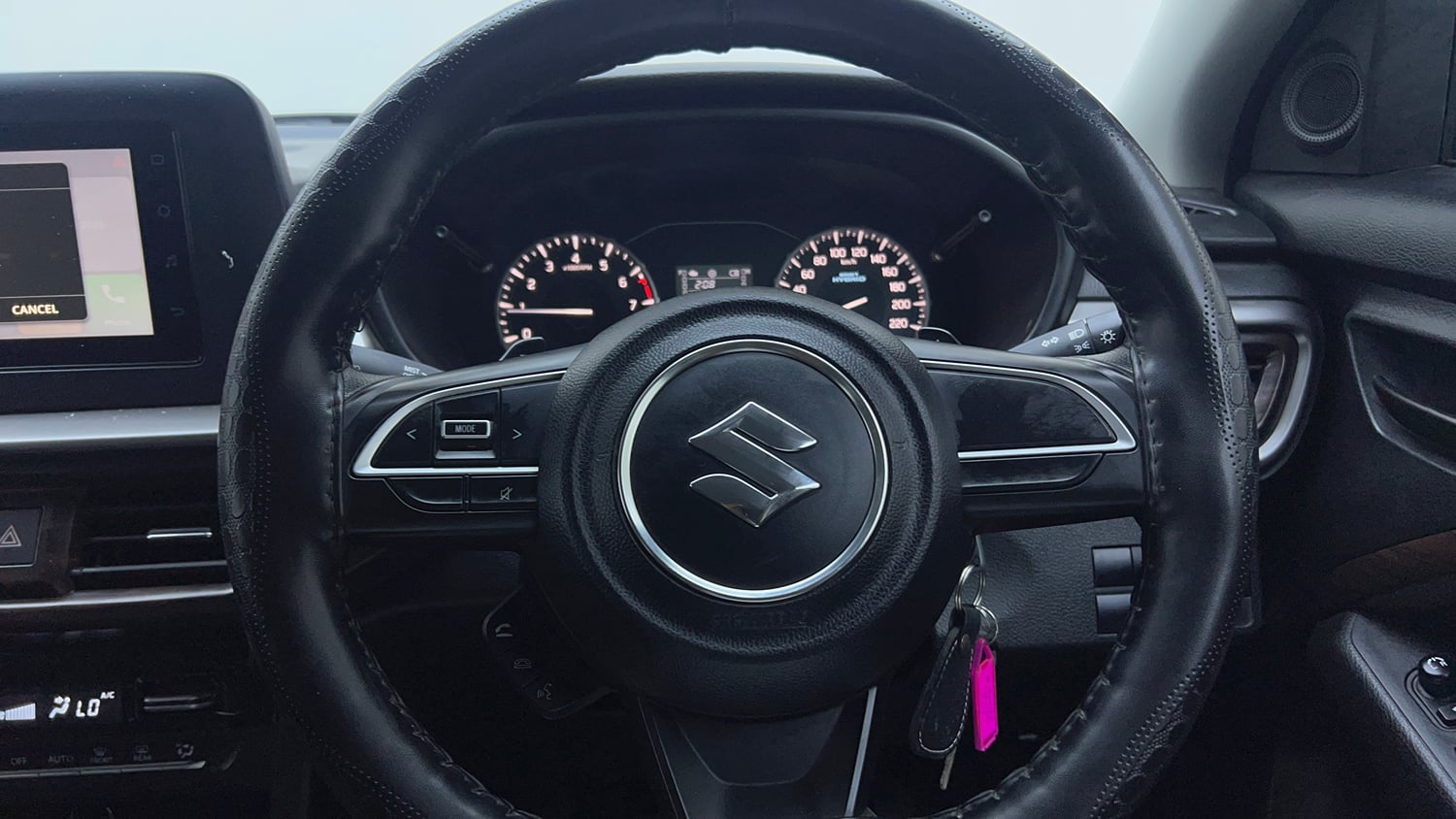 Used 2022 Maruti Suzuki Brezza Vxi AT Petrol Automatic top_features Steering mounted controls