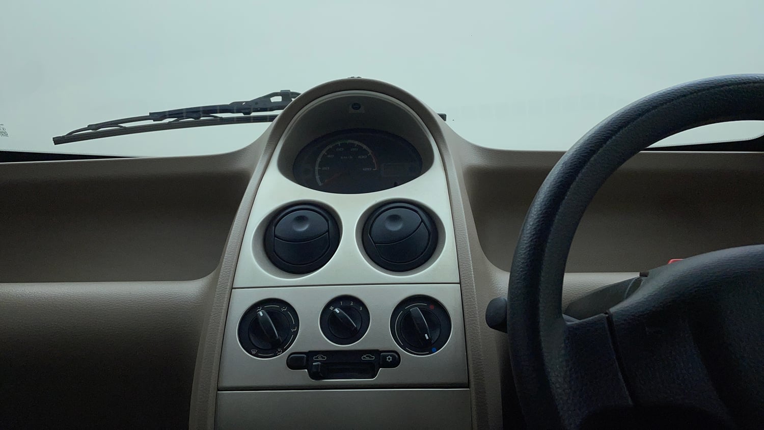 Used 2012 Tata Nano LX Petrol Manual interior MUSIC SYSTEM & AC CONTROL VIEW