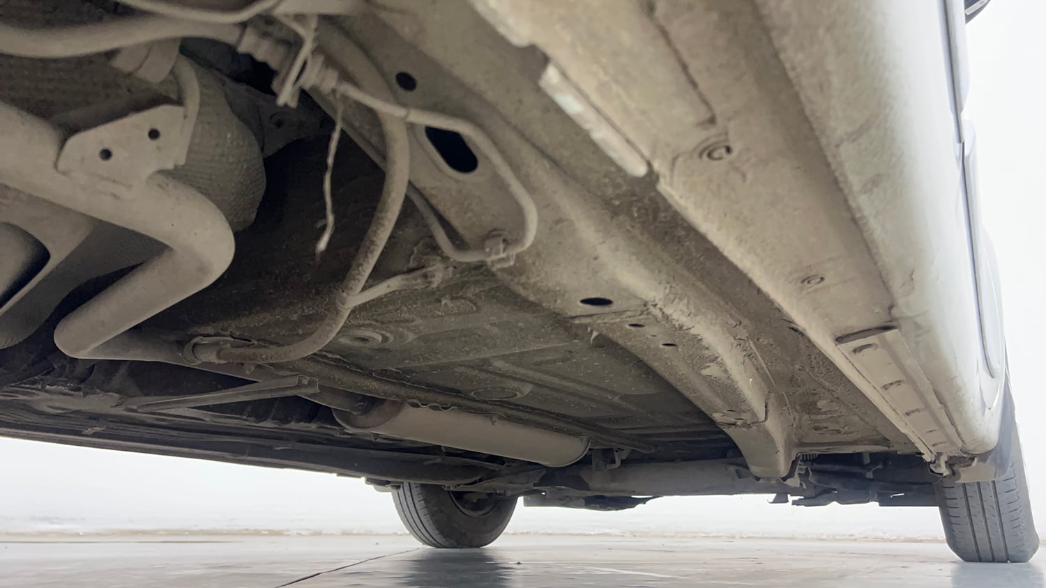 Used 2019 Maruti Suzuki Dzire VXi AMT Petrol Automatic extra REAR RIGHT UNDERBODY VIEW