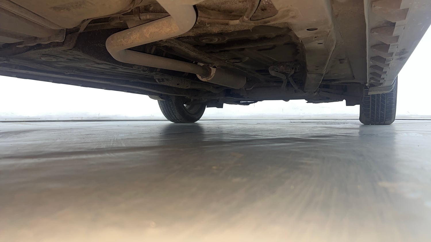 Used 2022 Maruti Suzuki XL6 Alpha Plus AT Petrol Petrol Automatic extra REAR RIGHT UNDERBODY VIEW