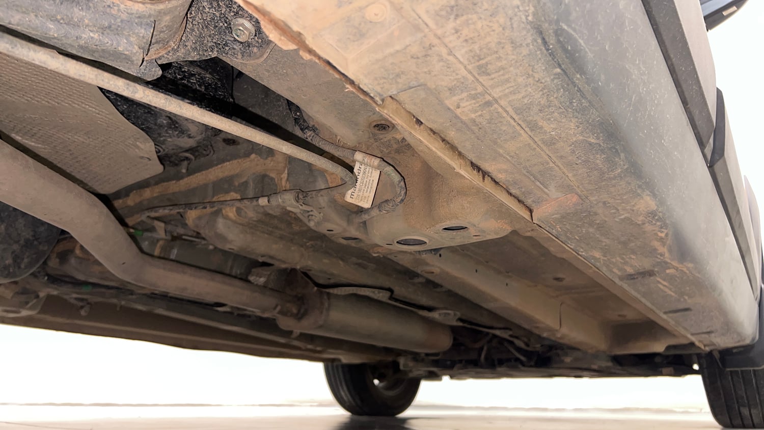 Used 2026 Mahindra XUV 3XO AX5 1.2 Petrol AT Petrol Automatic extra REAR RIGHT UNDERBODY VIEW