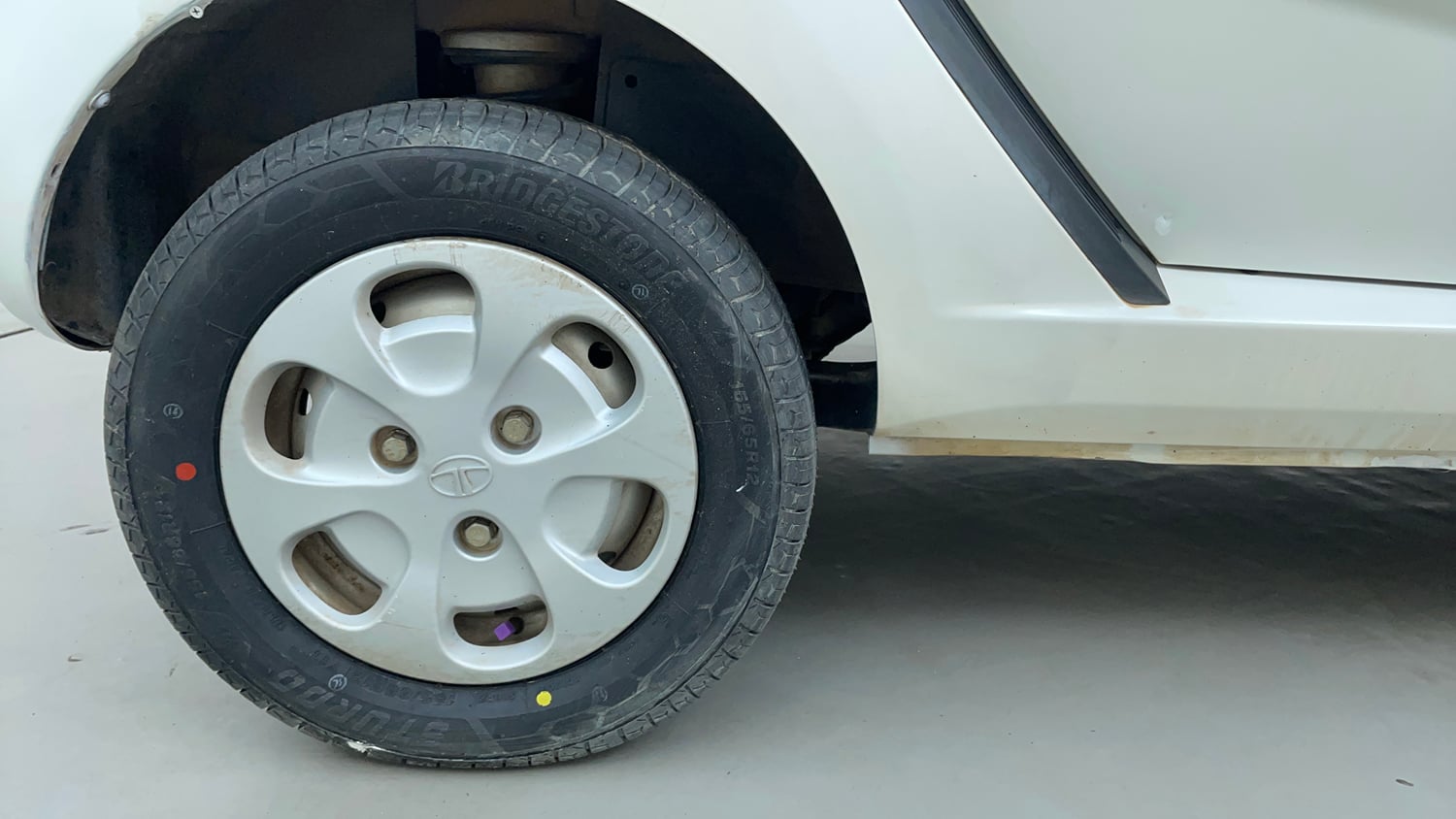 Used 2012 Tata Nano LX Petrol Manual tyres RIGHT REAR TYRE RIM VIEW