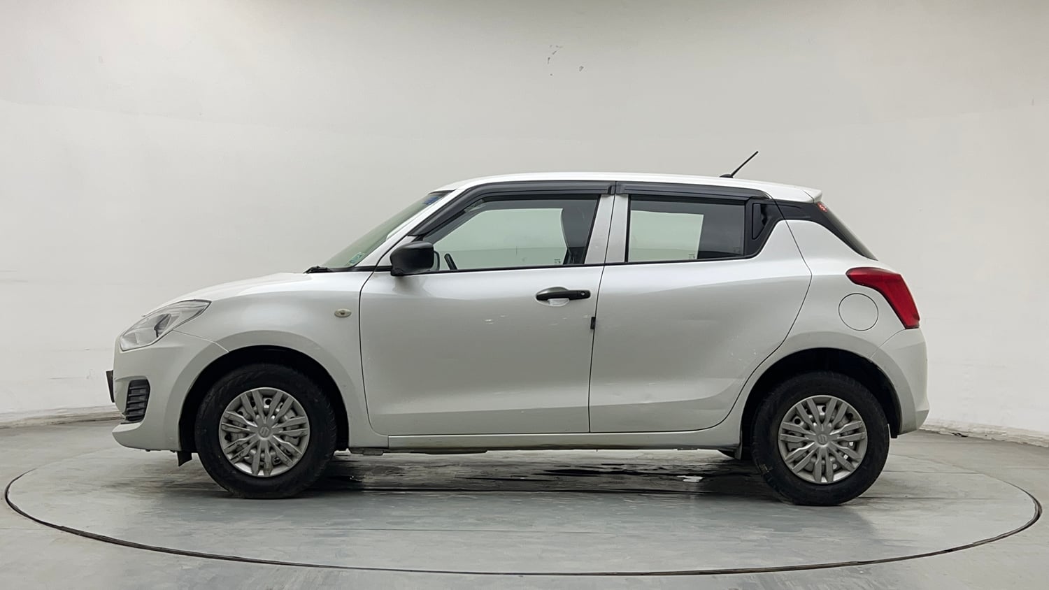 Used 2022 Maruti Suzuki Swift LXi Petrol Manual exterior LEFT SIDE VIEW