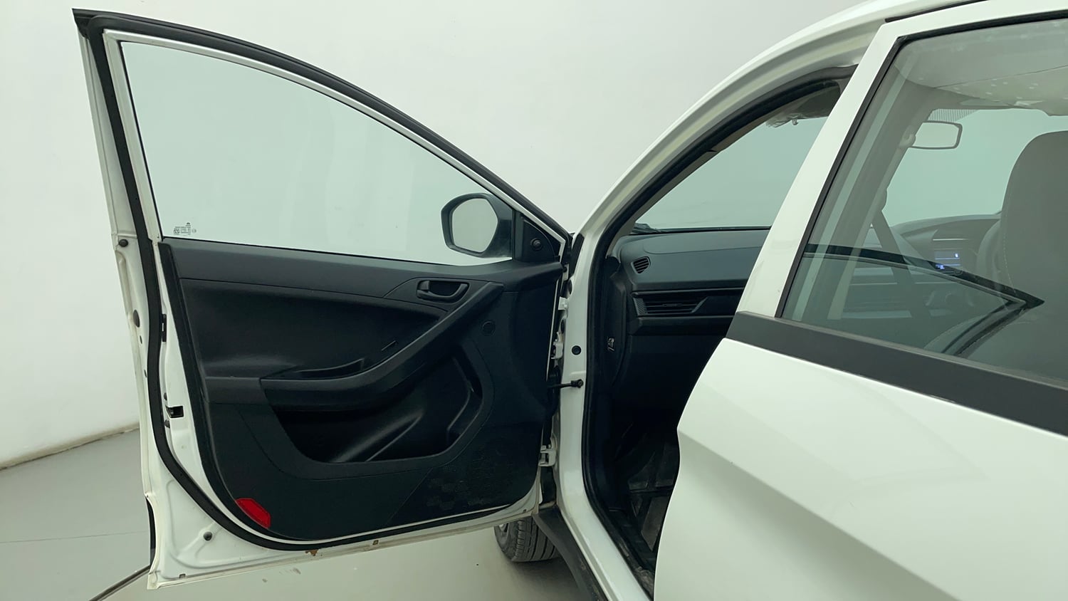 Used 2024 Tata Nexon Smart 1.2 Revotron Petrol 5MT Petrol Manual interior LEFT FRONT DOOR OPEN VIEW
