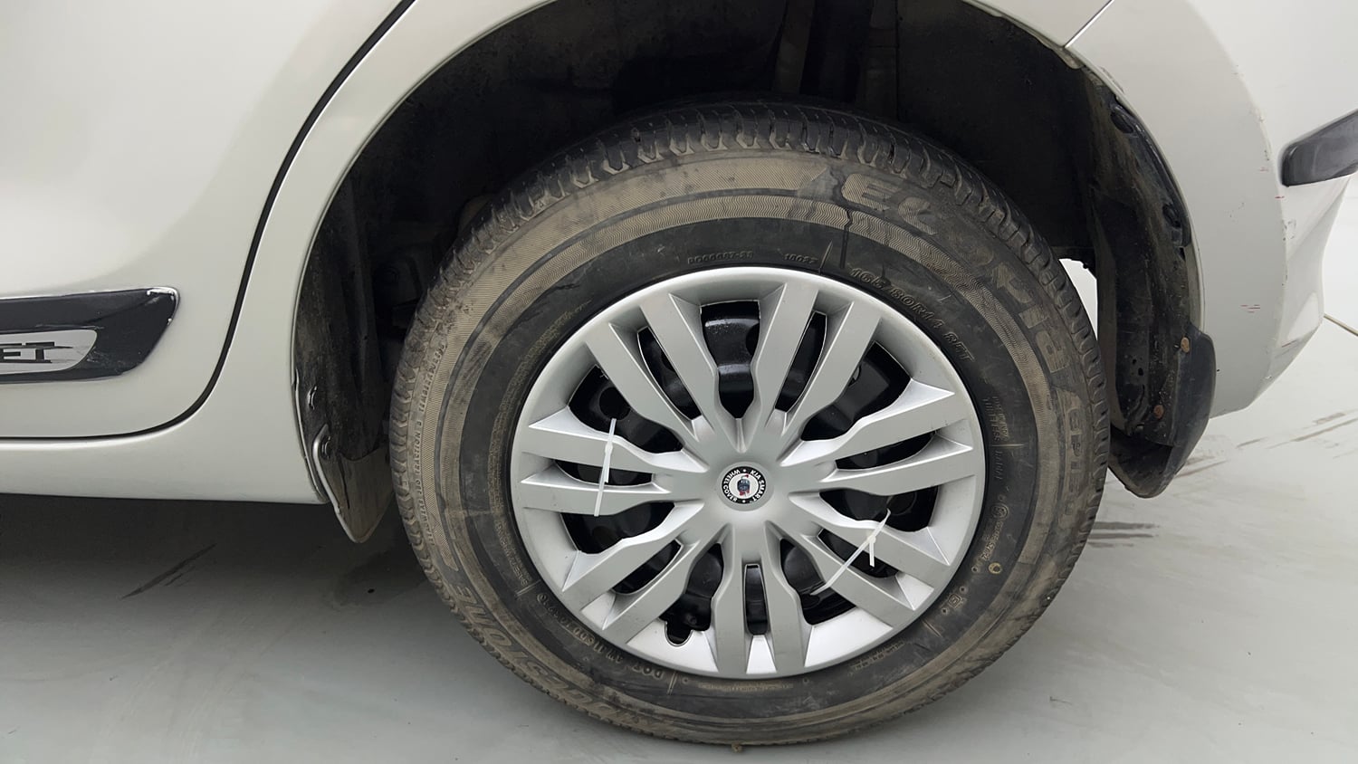 Used 2021 Maruti Suzuki Swift VXi Petrol Manual tyres LEFT REAR TYRE RIM VIEW