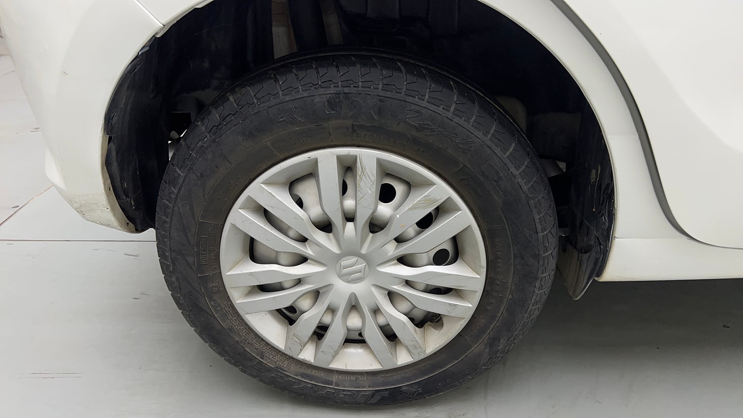 Used 2022 Maruti Suzuki Swift LXi Petrol Manual tyres RIGHT REAR TYRE RIM VIEW