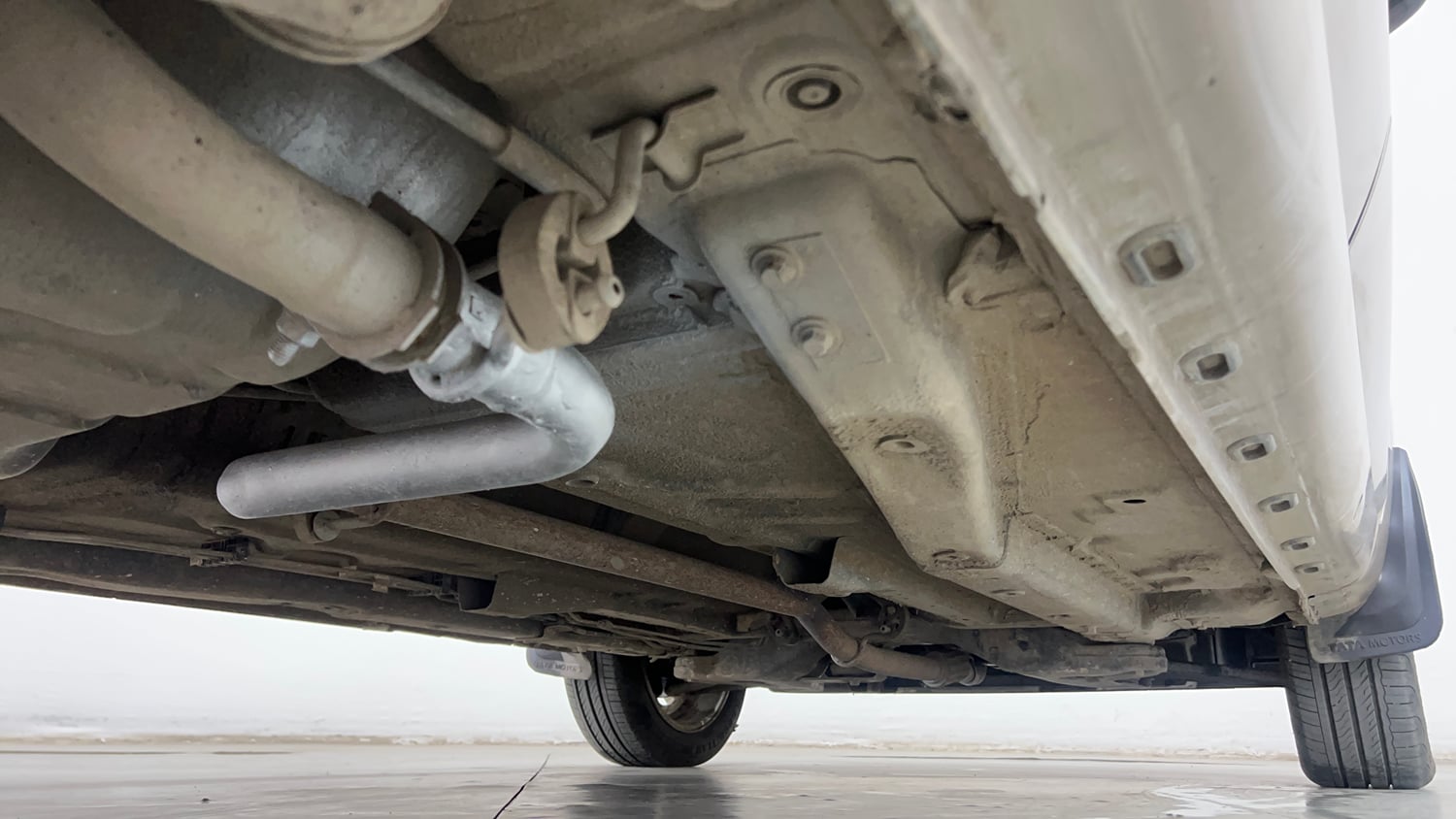 Used 2014 Tata Zest XMS Petrol Petrol Manual extra REAR RIGHT UNDERBODY VIEW