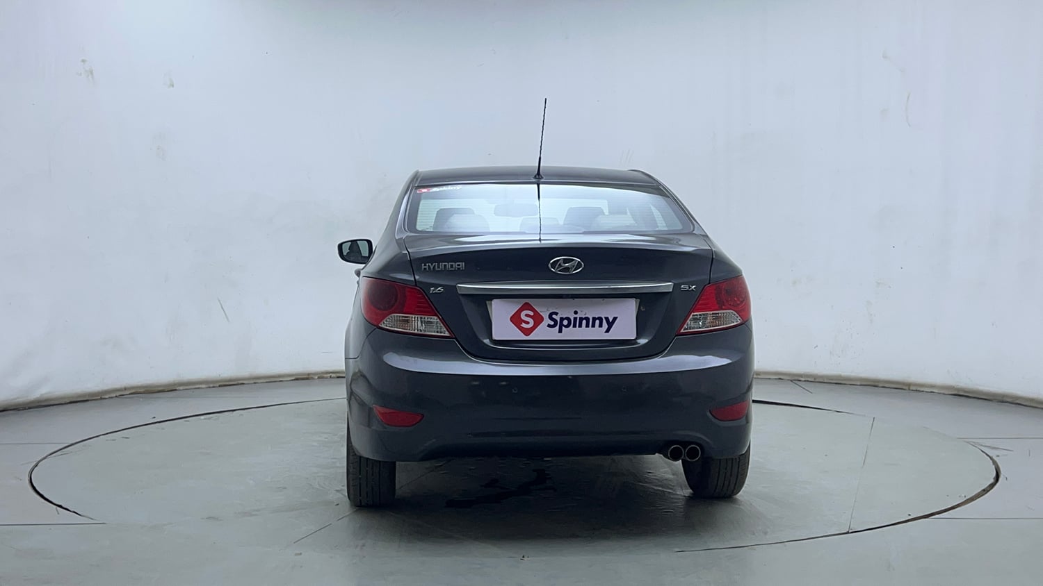 Used 2012 Hyundai Verna Fluidic 1.6 VTVT SX Petrol Manual exterior BACK VIEW