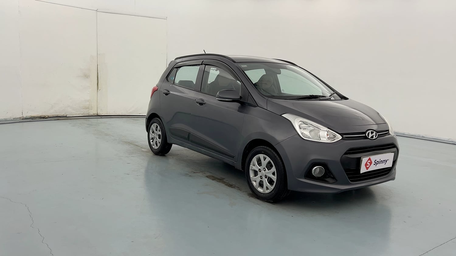 Used 2015 Hyundai Grand i10 Sportz 1.2 Kappa VTVT Petrol Manual exterior RIGHT FRONT CORNER VIEW
