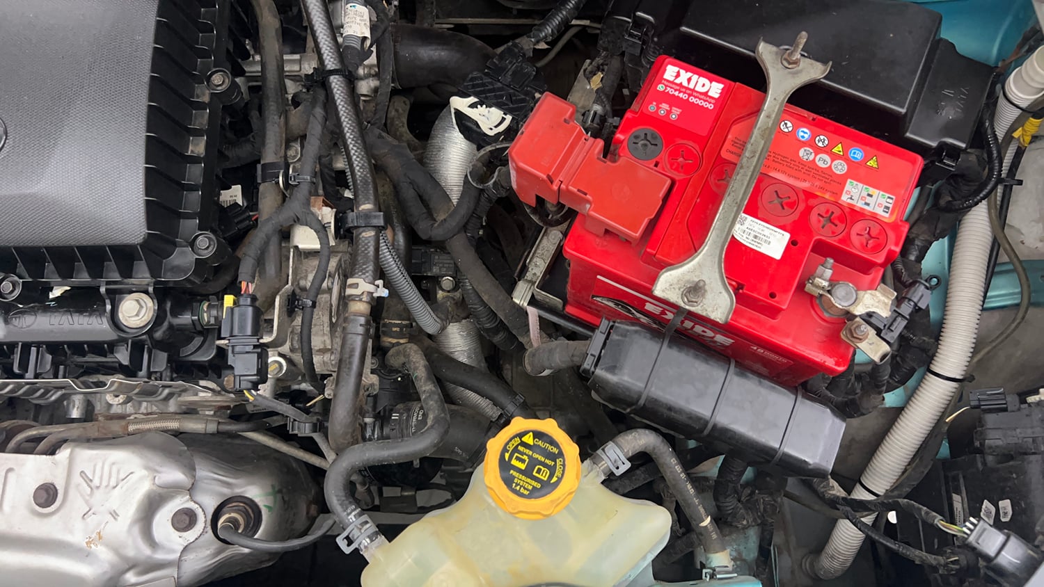 Used 2024 Tata Nexon Creative Plus 1.2 Revotron Petrol 7DCA Petrol Automatic engine ENGINE LEFT SIDE VIEW