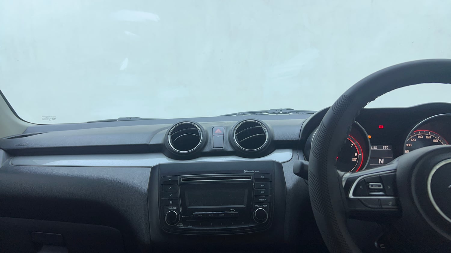 Used 2018 Maruti Suzuki Swift ZXi AMT Petrol Automatic top_features Integrated (in-dash) music system