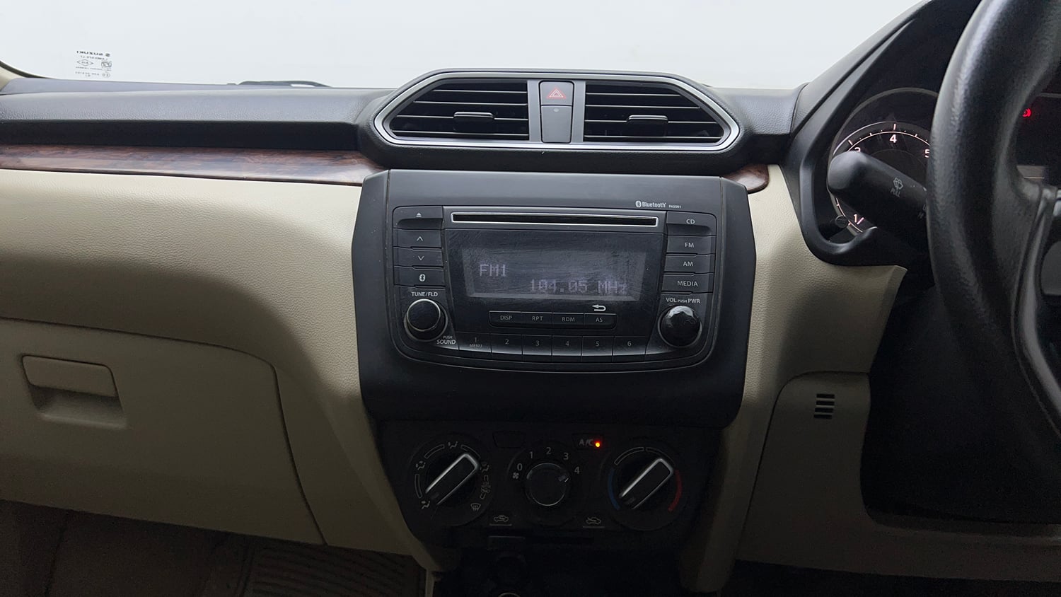 Used 2018 Maruti Suzuki Dzire VDi Diesel Manual top_features Integrated (in-dash) music system