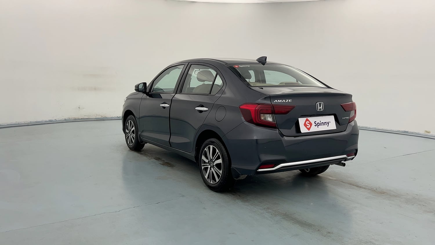 Used 2024 honda Amaze 2nd Generation VX 1.2 Petrol MT Petrol Manual exterior LEFT REAR CORNER VIEW