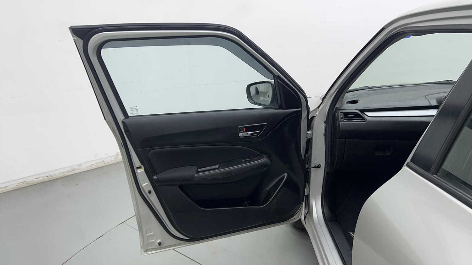 Used 2021 Maruti Suzuki Swift VXi Petrol Manual interior LEFT FRONT DOOR OPEN VIEW