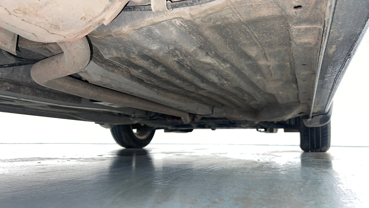 Used 2024 honda Amaze 2nd Generation VX 1.2 Petrol MT Petrol Manual extra REAR RIGHT UNDERBODY VIEW
