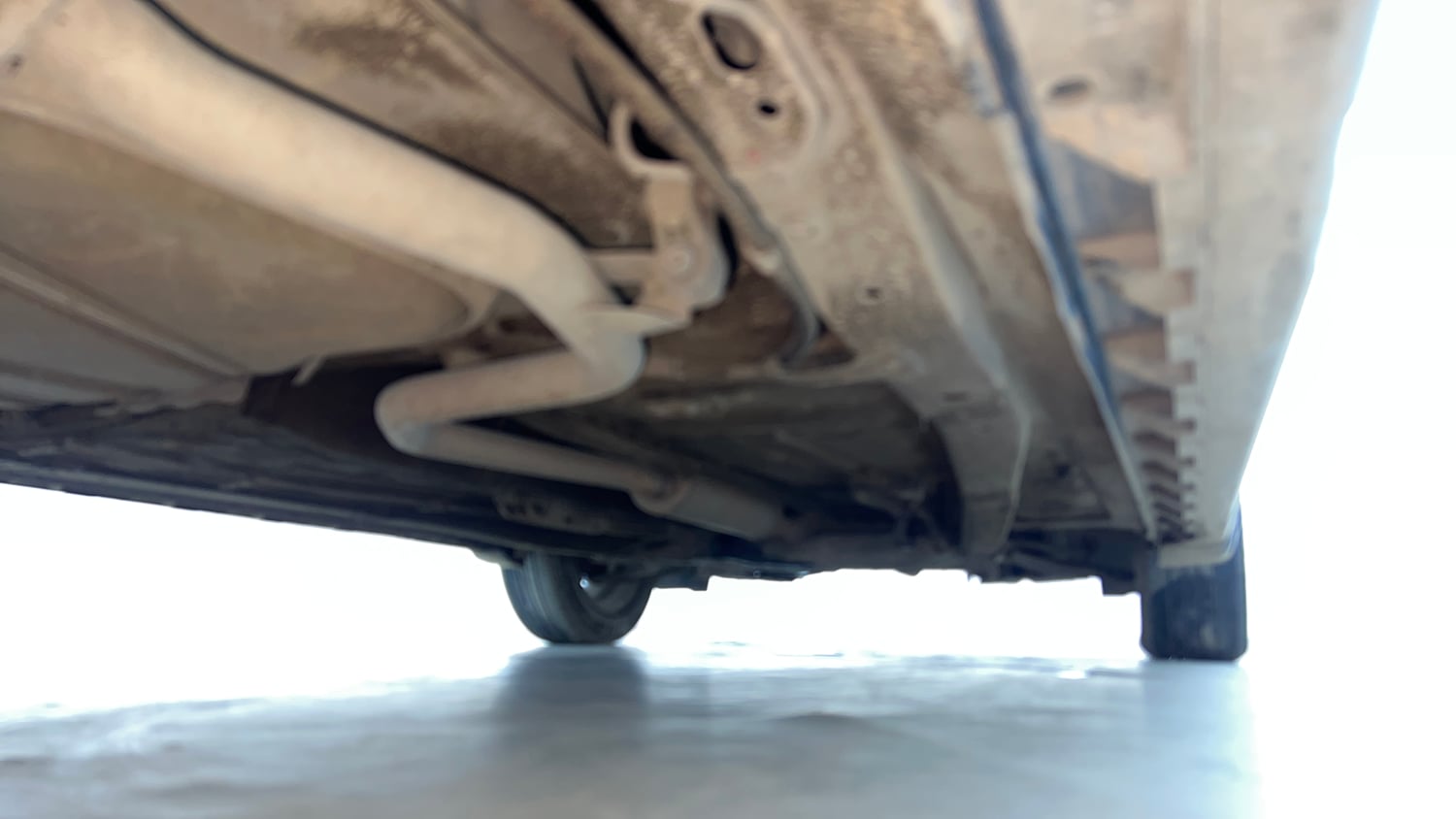 Used 2023 Maruti Suzuki XL6 Alpha Plus MT Petrol Petrol Manual extra REAR RIGHT UNDERBODY VIEW