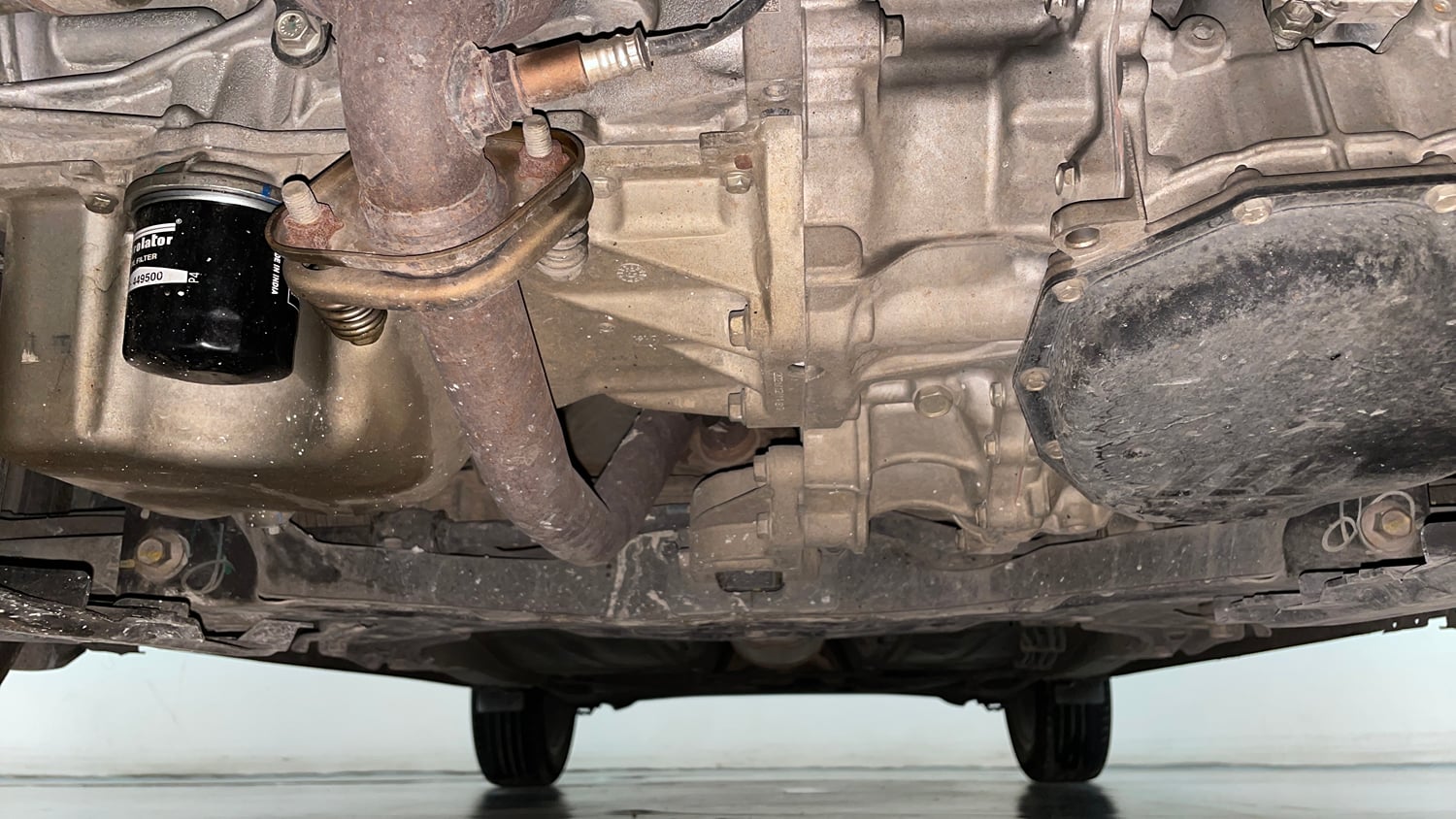 Used 2022 Toyota Glanza V CVT Petrol Automatic extra FRONT LEFT UNDERBODY VIEW