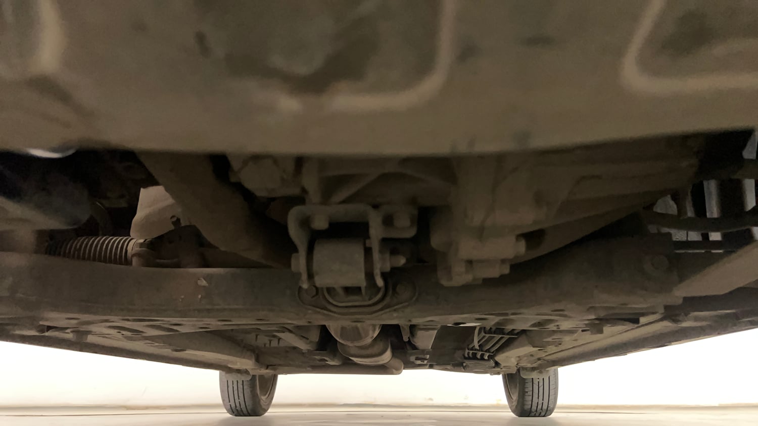 Used 2022 Hyundai New i20 Asta (O) 1.0 Turbo DCT Petrol Automatic extra FRONT LEFT UNDERBODY VIEW