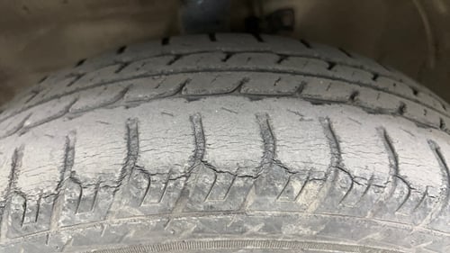 Used 2013 Maruti Suzuki Wagon R VXI Petrol Manual tyres LEFT FRONT TYRE TREAD VIEW