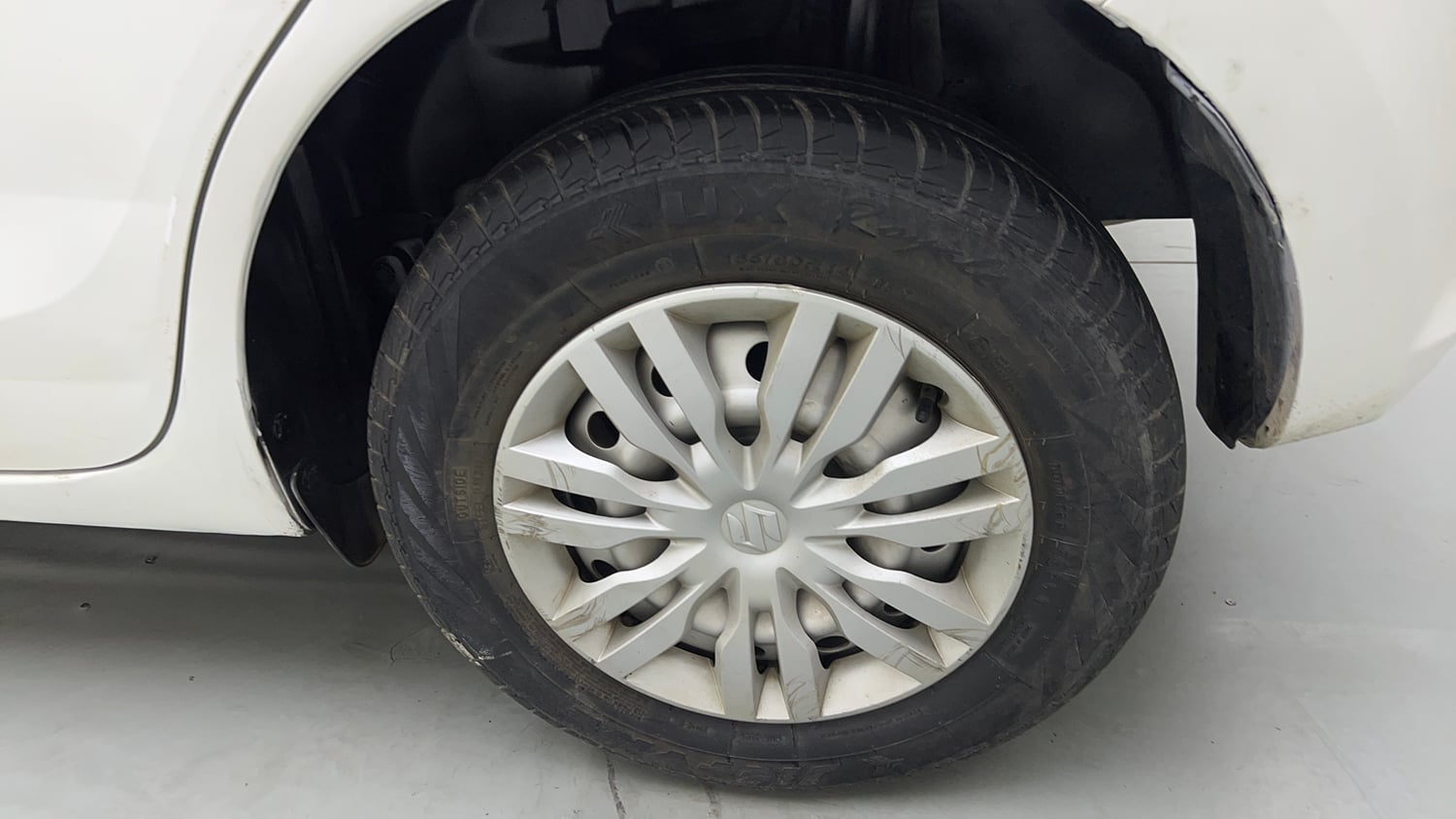 Used 2022 Maruti Suzuki Swift LXi Petrol Manual tyres LEFT REAR TYRE RIM VIEW