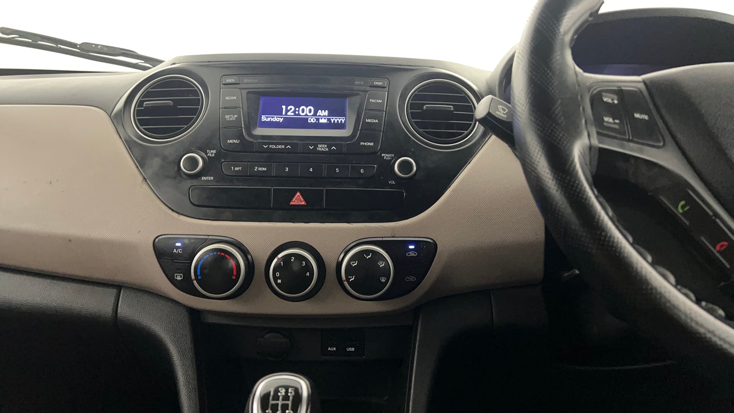 Used 2015 Hyundai Grand i10 Sportz 1.2 Kappa VTVT Petrol Manual interior MUSIC SYSTEM & AC CONTROL VIEW