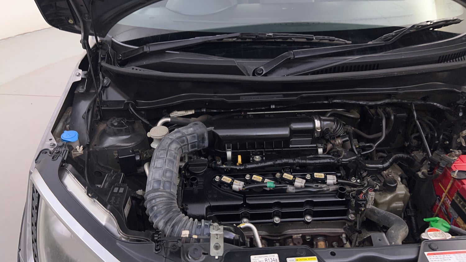 Used 2017 Maruti Suzuki Ignis Zeta 1.2 AMT Petrol Automatic engine ENGINE RIGHT SIDE HINGE & APRON VIEW