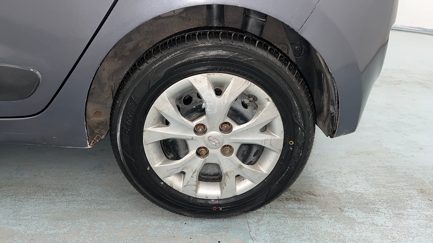 Used 2015 Hyundai Grand i10 Sportz 1.2 Kappa VTVT Petrol Manual tyres LEFT REAR TYRE RIM VIEW