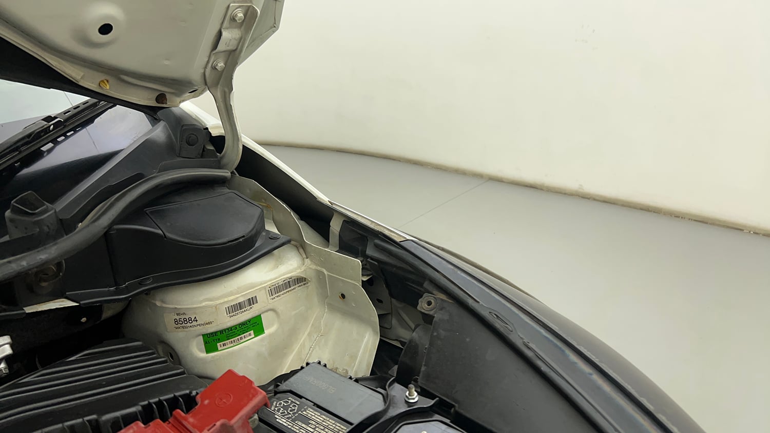 Used 2022 Tata Altroz XZ Plus Petrol+CNG (Outside Fitted) Cng Manual engine ENGINE LEFT SIDE HINGE & APRON VIEW
