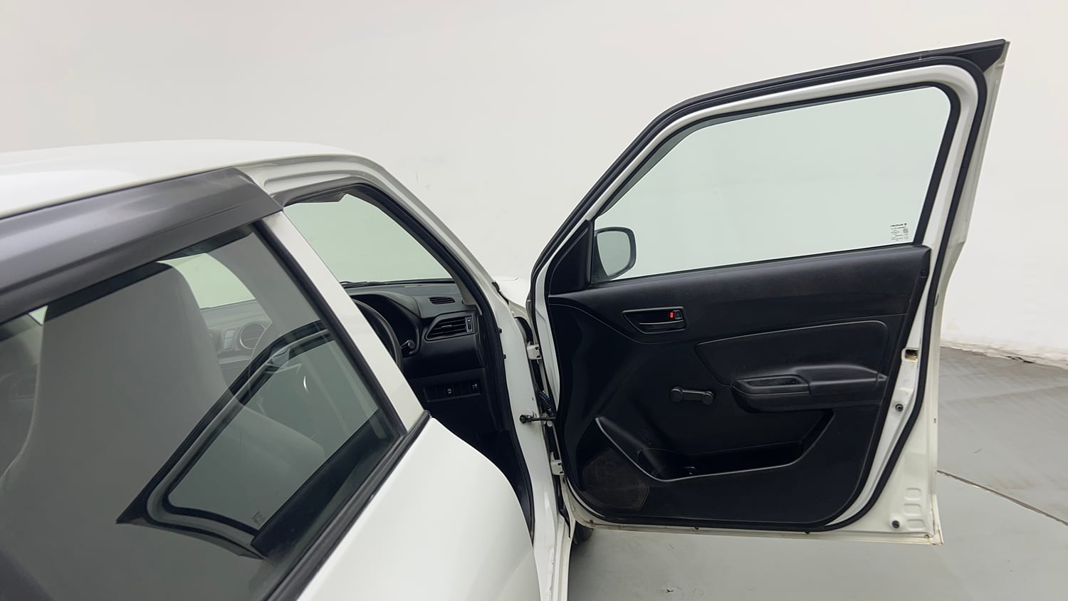Used 2022 Maruti Suzuki Swift LXi Petrol Manual interior RIGHT FRONT DOOR OPEN VIEW
