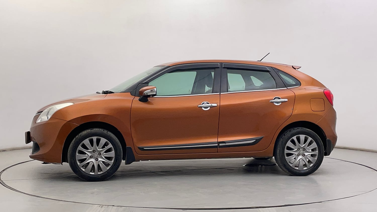 Used 2016 Maruti Suzuki Baleno Zeta 1.2 Petrol Manual exterior LEFT SIDE VIEW