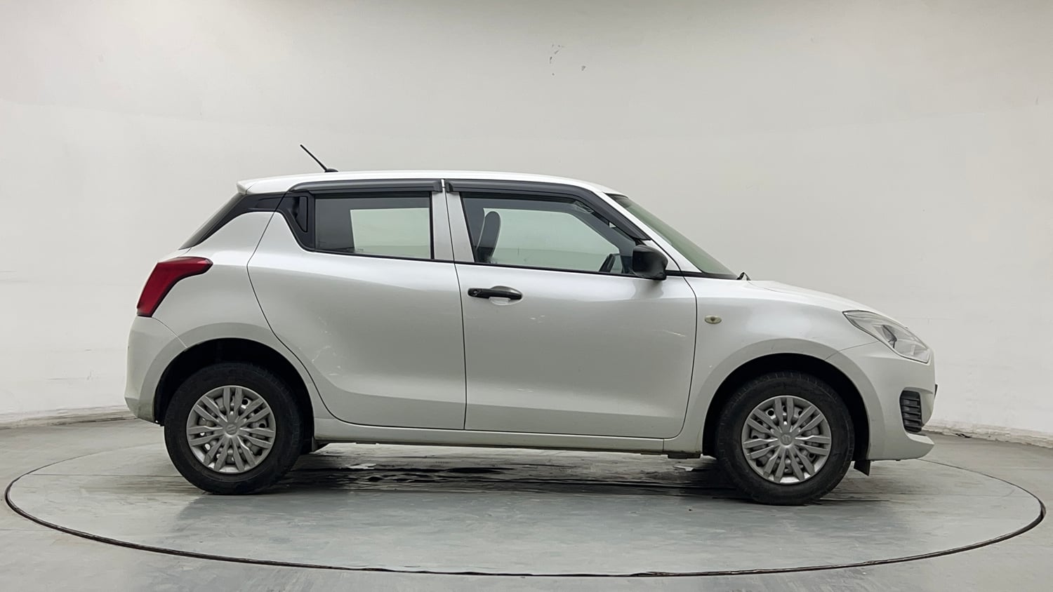 Used 2022 Maruti Suzuki Swift LXi Petrol Manual exterior RIGHT SIDE VIEW