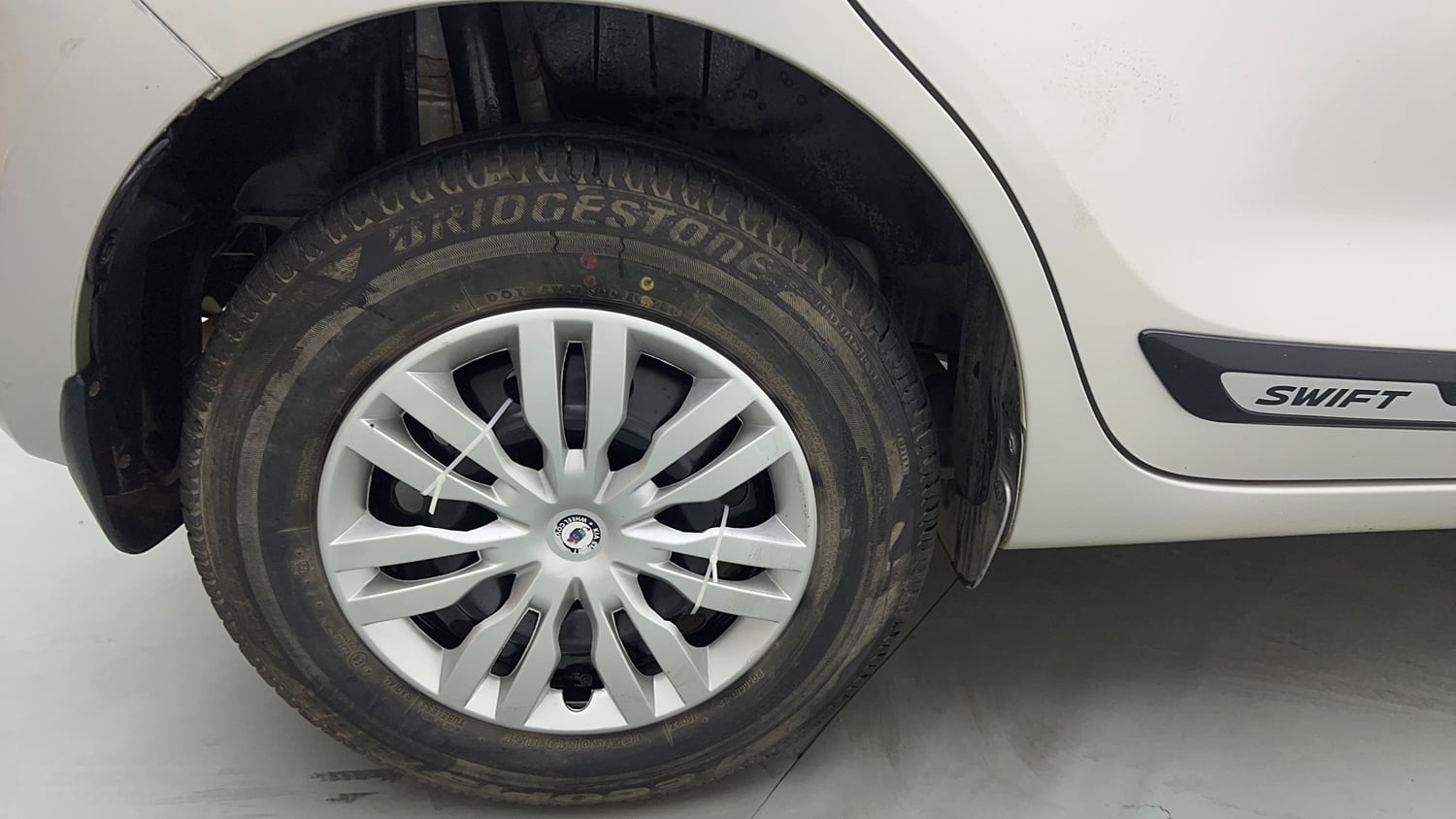 Used 2021 Maruti Suzuki Swift VXi Petrol Manual tyres RIGHT REAR TYRE RIM VIEW