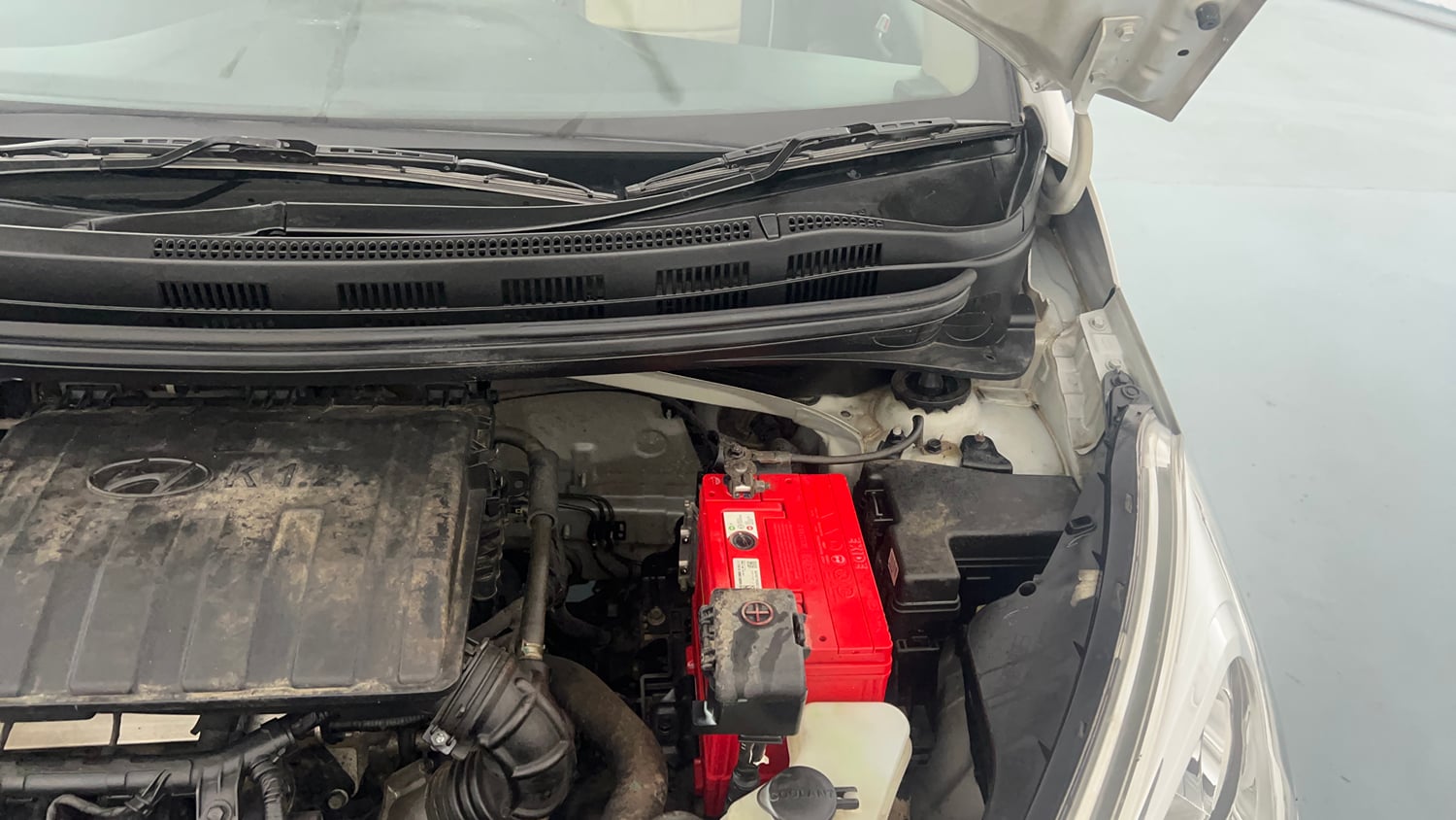 Used 2016 Hyundai Grand i10 Sportz 1.2 Kappa VTVT Petrol Manual engine ENGINE LEFT SIDE HINGE & APRON VIEW
